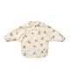 Liewood  Babero  con mangas y bolsillo Elefante Creme de la creme