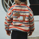Konges Slojd forro polar infantil con estampado Joddy Teddy Tangerine Stripe bordado