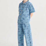 Bobo Choses Camisa vaquera para niño  con estampado Pickle the Dog por toda la prenda.
