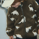 Konges Slojd Chaqueta polar para niños Joddy Teddy GRS Silueta Dino