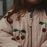 Konges Slojd chaqueta bomber térmica Juno lentejuelas camafeo rosa