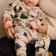 Liewood Pelele pijama Birk Grow Dino roar / Sandy